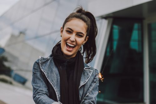 a young woman smiling